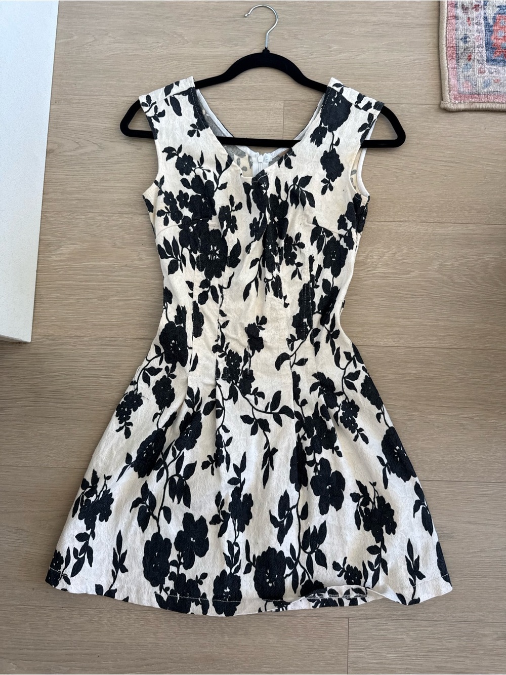 Sleeveless Black Floral Mini Dress in White - Classic Fit